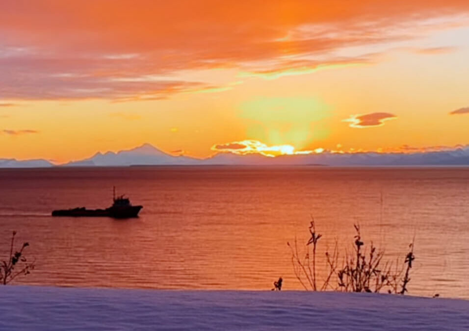 Sunset after the first winter snow of the year over Cook Inlet, Alaska